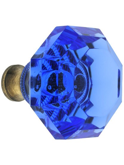 Blue Octagonal Crystal Knob with Solid Brass Base in Antique Brass.